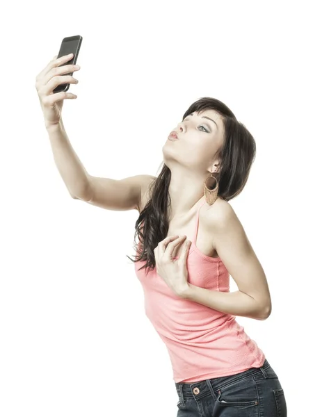 A girl is making a photograph of herself — Stock Photo, Image