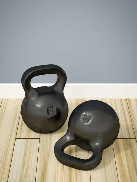 Kettlebells no chão de madeira — Fotografia de Stock