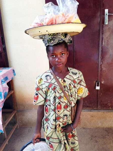 Young African fruit vendor — Stock Photo, Image