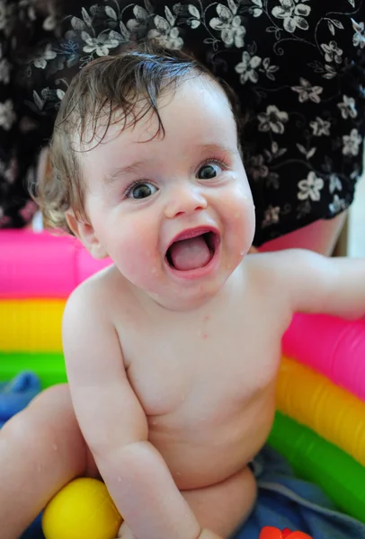 Happy baby bathing — Stockfoto