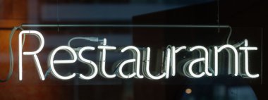 sign Restaurant in a window