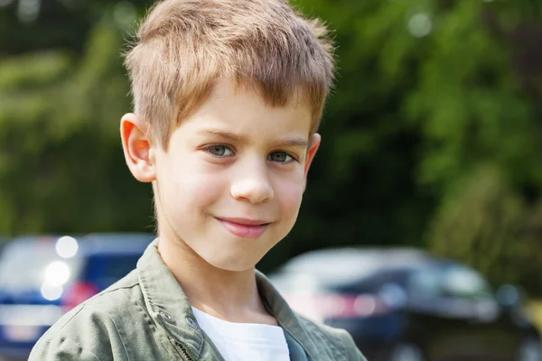 Blond boy in park — Stock Photo, Image