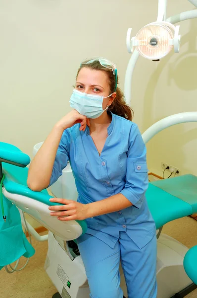 Dentist at her office — Stock Photo, Image