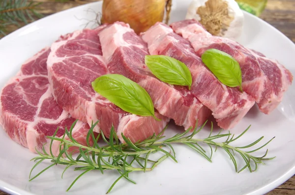 Neck with rosemary and basil — Stock Photo, Image