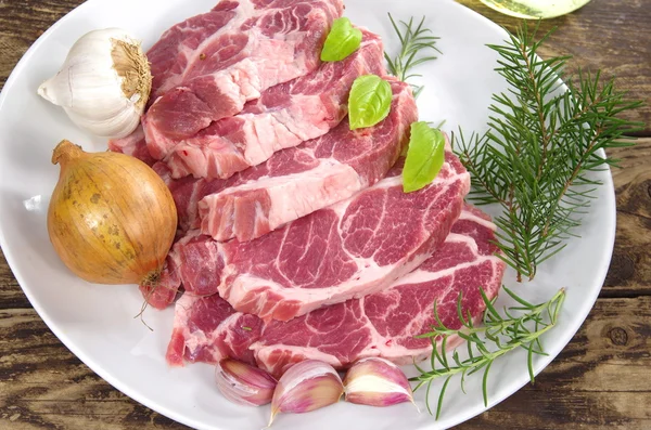 Neck with rosemary and basil — Stock Photo, Image