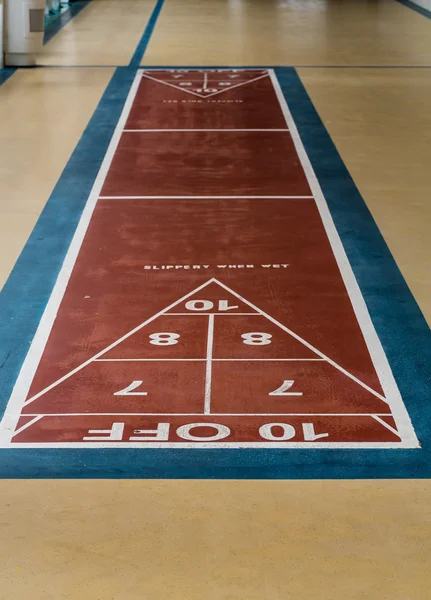 Shuffleboard resbaladizo cuando mojado — Foto de Stock