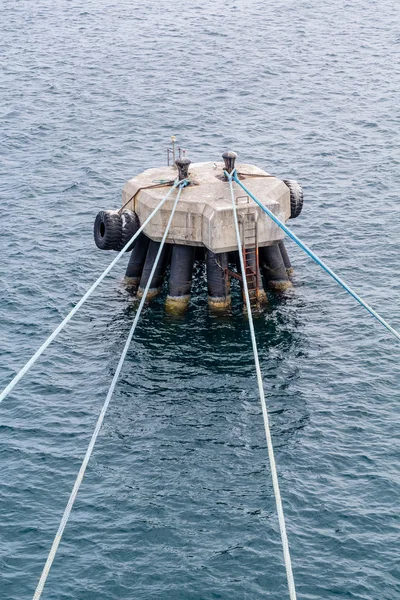 Four Ropes to Concrete Piling — Stock Photo, Image