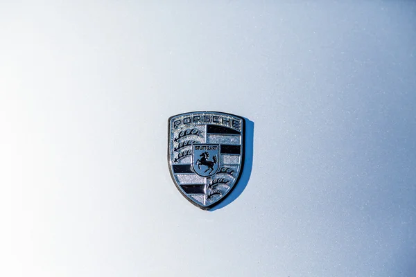Porsche Logo on White Car — Stock Photo, Image