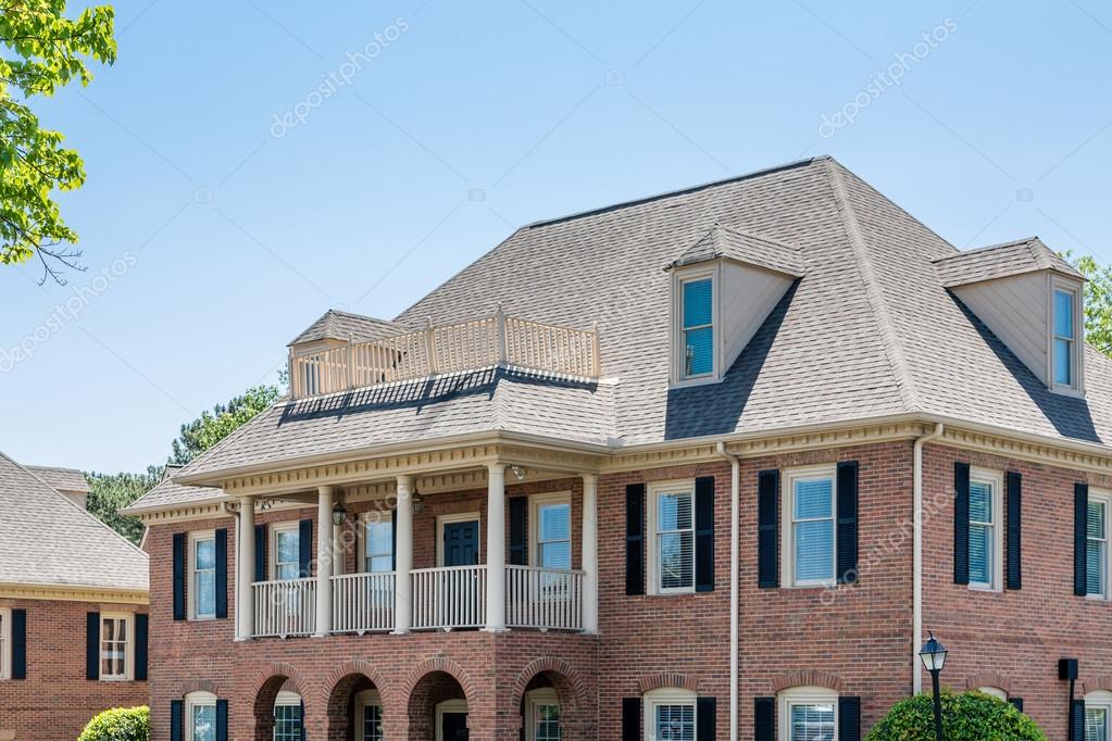 Traditional Brick Office Building With Dormers Stock Photo