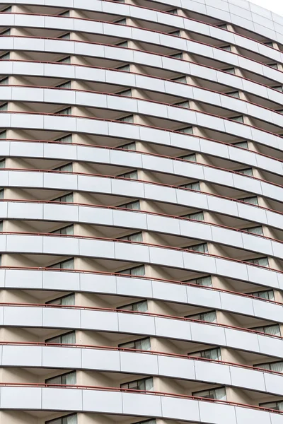 Many Balconies on Curved Glass Hotel — Stock Photo, Image