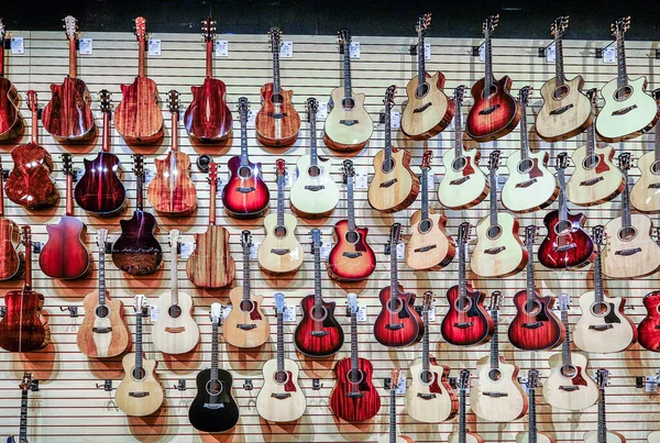 Wall of Acoustic Guitars — Stock Photo, Image