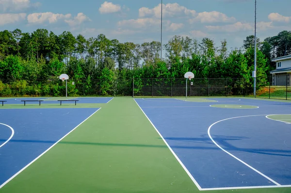 Two Public Basketball Courts Royalty Free Stock Photos
