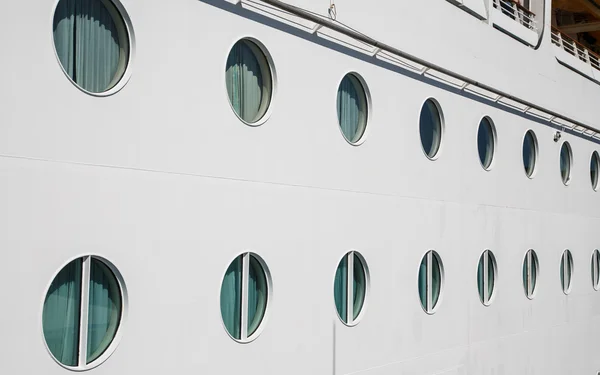 Lines of Portholes on White Bulkhead — Stock Photo, Image