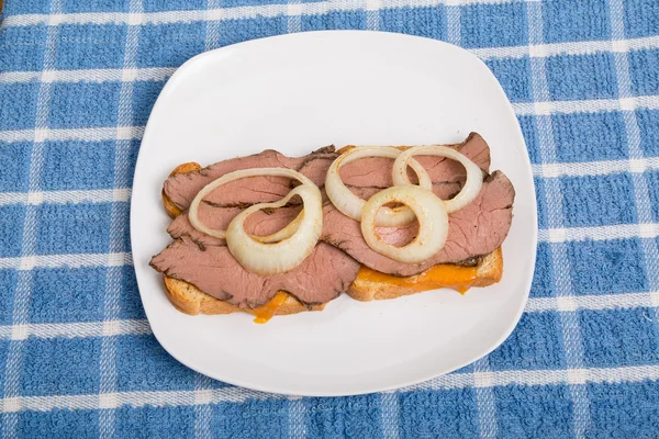 Sliced Beef Sandwich on Blue Towel Stock Image