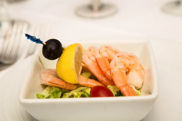 Shrimp Cocktail with Lemon Wedge and Olive — Stock Photo, Image