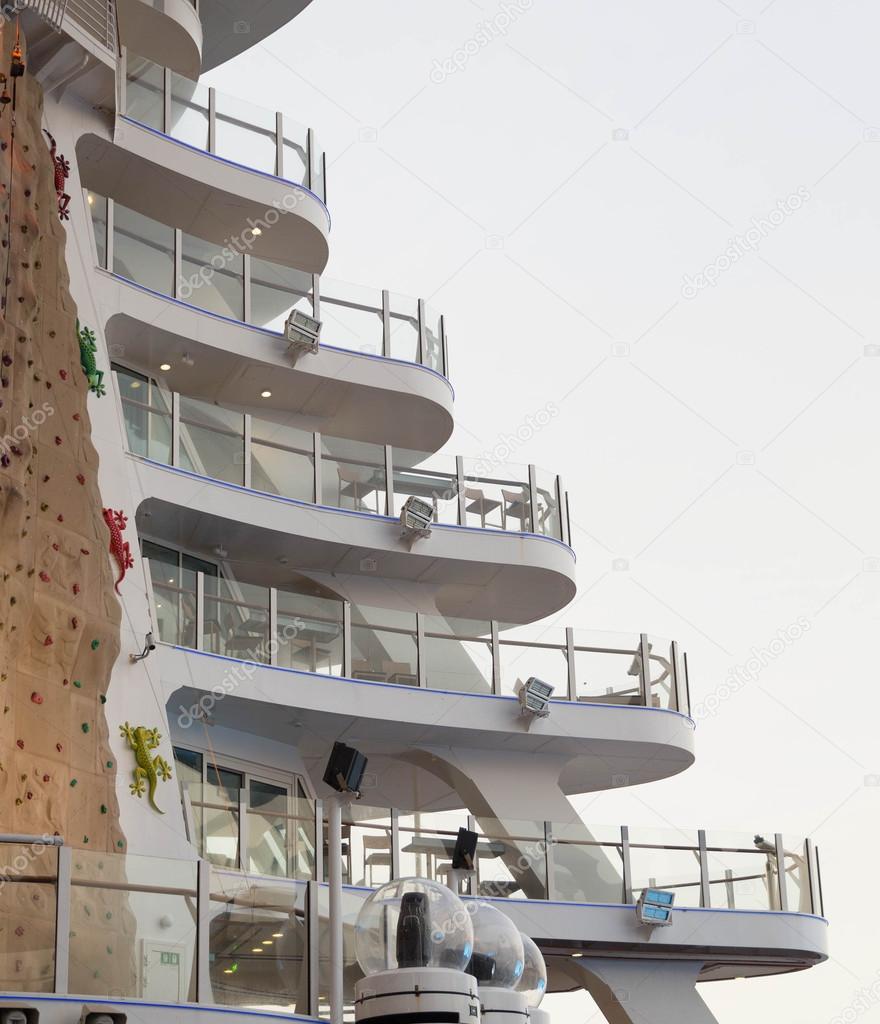 White Cruise Ship Balconies by Rock Climbing Wall
