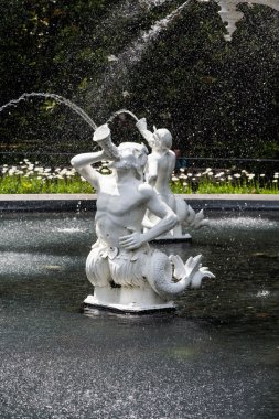 Statues Spouting Water in Forsyth Park Fountain clipart