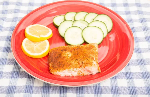 Baked Salmon with Lemon and Cucumber Slices — Stock Photo, Image