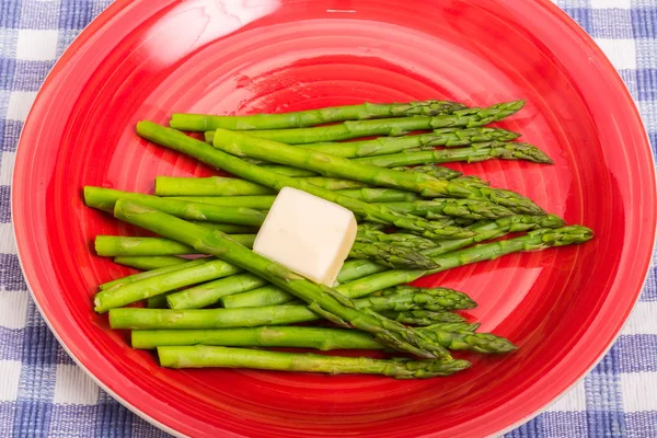 Buttered Asparagus on Red Plate — Stock Photo, Image