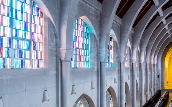 Stained Glass Between Stone Arches — Stock Photo, Image