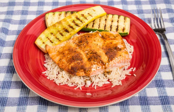 Salmon on Rice with Squash on Red Plate — Stock Photo, Image
