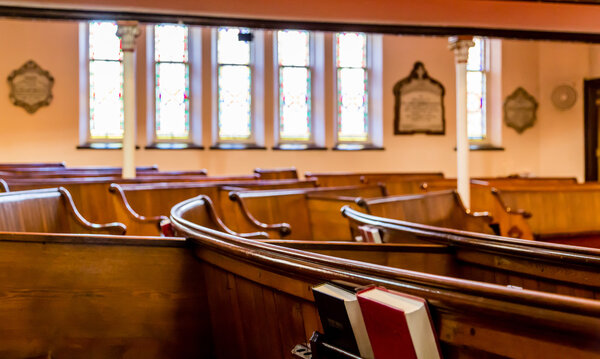 Pews with Stained Glass in Background