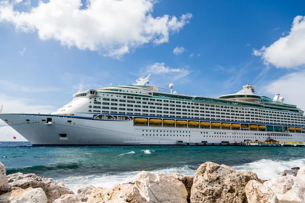 Luxury Cruise Ship Past Granite Rock Wall
