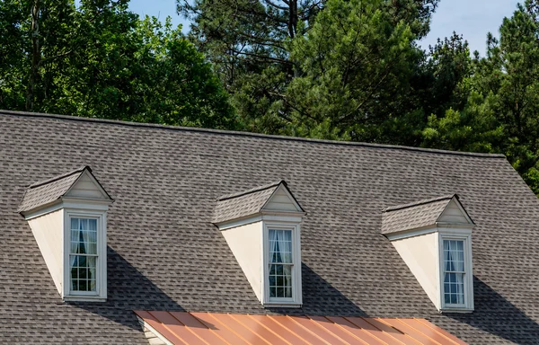 Three Dormers over Asphalt and Copper — Stock Photo, Image
