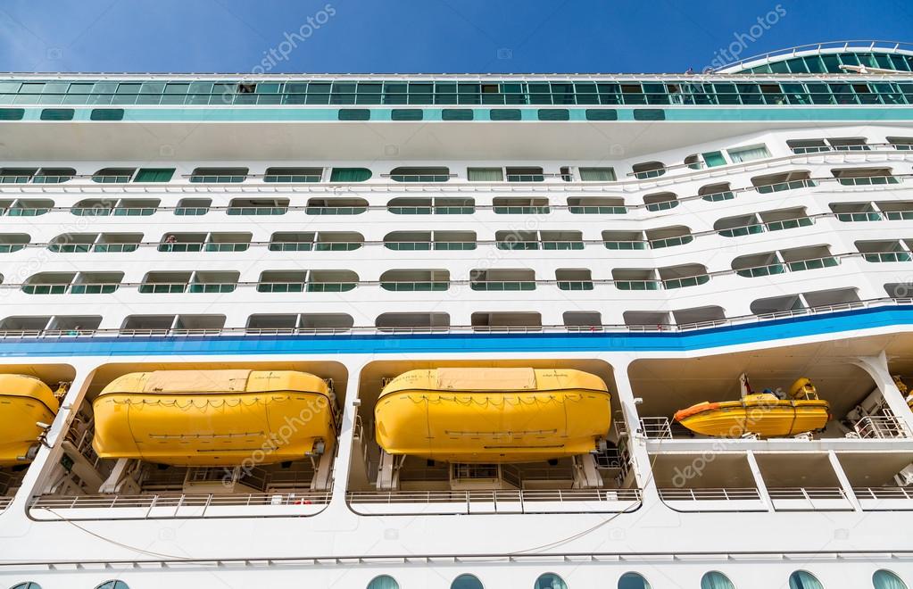 Yellow Lifeboats and Balconies from Below