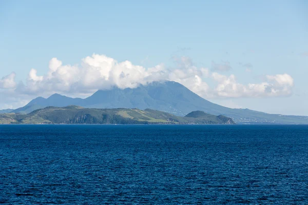 Green and Blue Hills Across Blue Sea — Stock Photo, Image