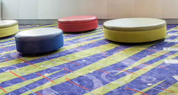 Colorful Cushions on Patterned Carpet — Stock Photo, Image