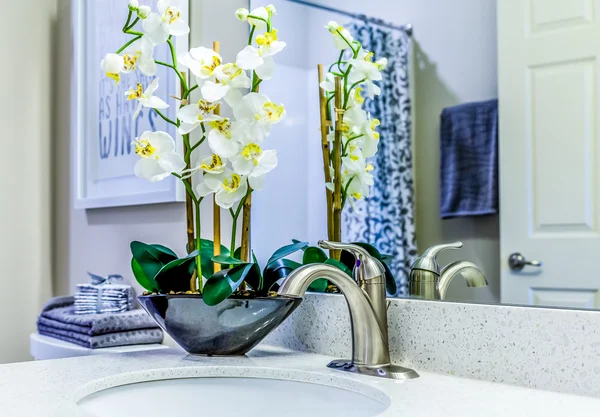 Orchids on Granite Vanity — Stock Photo, Image