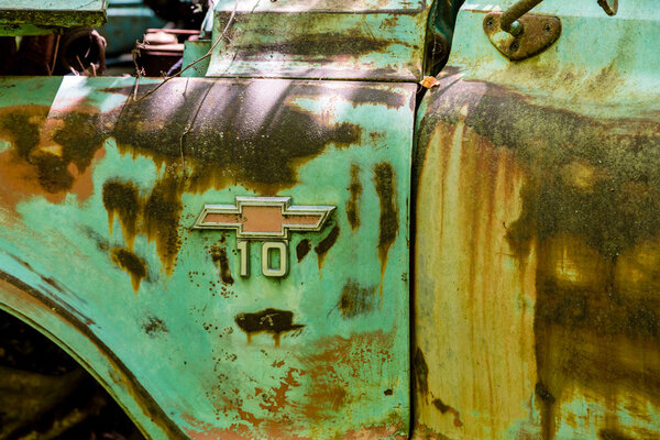 Logo on Old Green Chevy