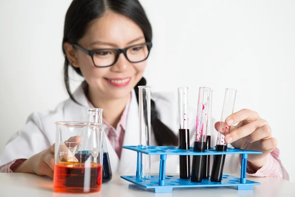 Asian lab people doing liquid sample analysis — Stock Photo, Image