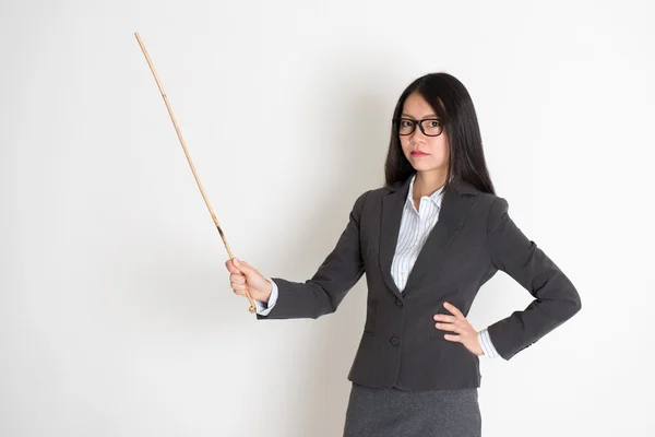 Asian female teacher in serious expression — Stock Photo, Image