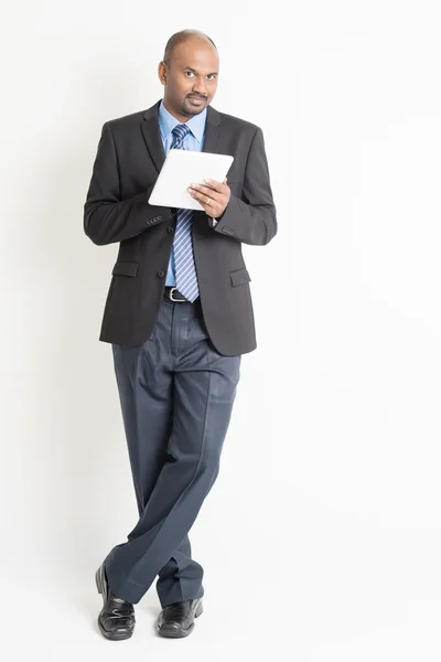 Indian businesspeople using tablet — Stock Photo, Image