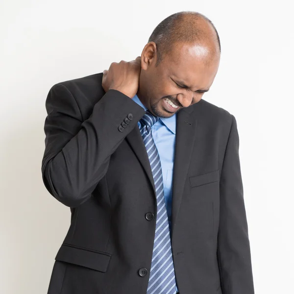 Indian businesspeople shoulder pain — Stock Photo, Image