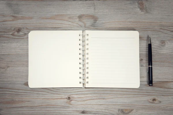 Diary on wooden desk — Stock Photo, Image