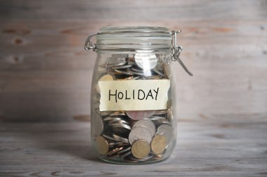 Para kavanozu tatil etiketi.