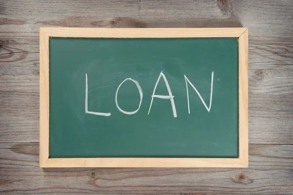 Loan letter on chalkboard — Stock Photo, Image