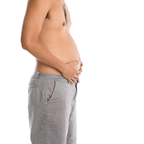 Hombre sosteniendo su vientre gordo — Foto de Stock