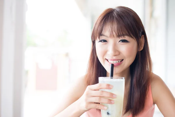 Girl Drinking beverage at cafe — 스톡 사진
