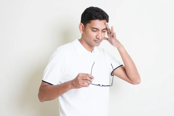 Indian guy with headache — Stockfoto