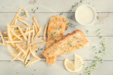 Top view fish and chips in vintage style