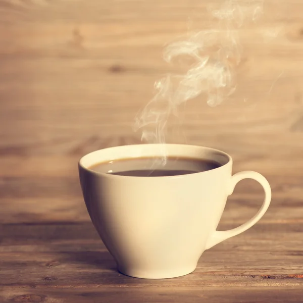 Steaming hot coffee in white cup — Stock Fotó