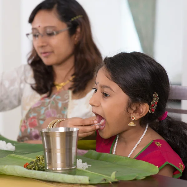 Indian family eating dinner at home — Stok fotoğraf