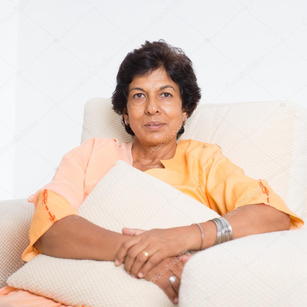 Indian mature woman portrait Stock Photo by ©szefei 82681910