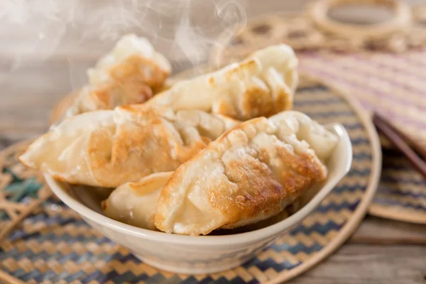 Famous Asian gourmet pan fried dumplings — Stock Photo, Image