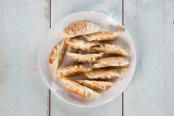 Top view Asian appetizer pan fried dumplings — Stock Photo, Image