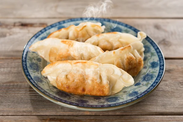 Asian food pan fried dumplings — Stock Photo, Image